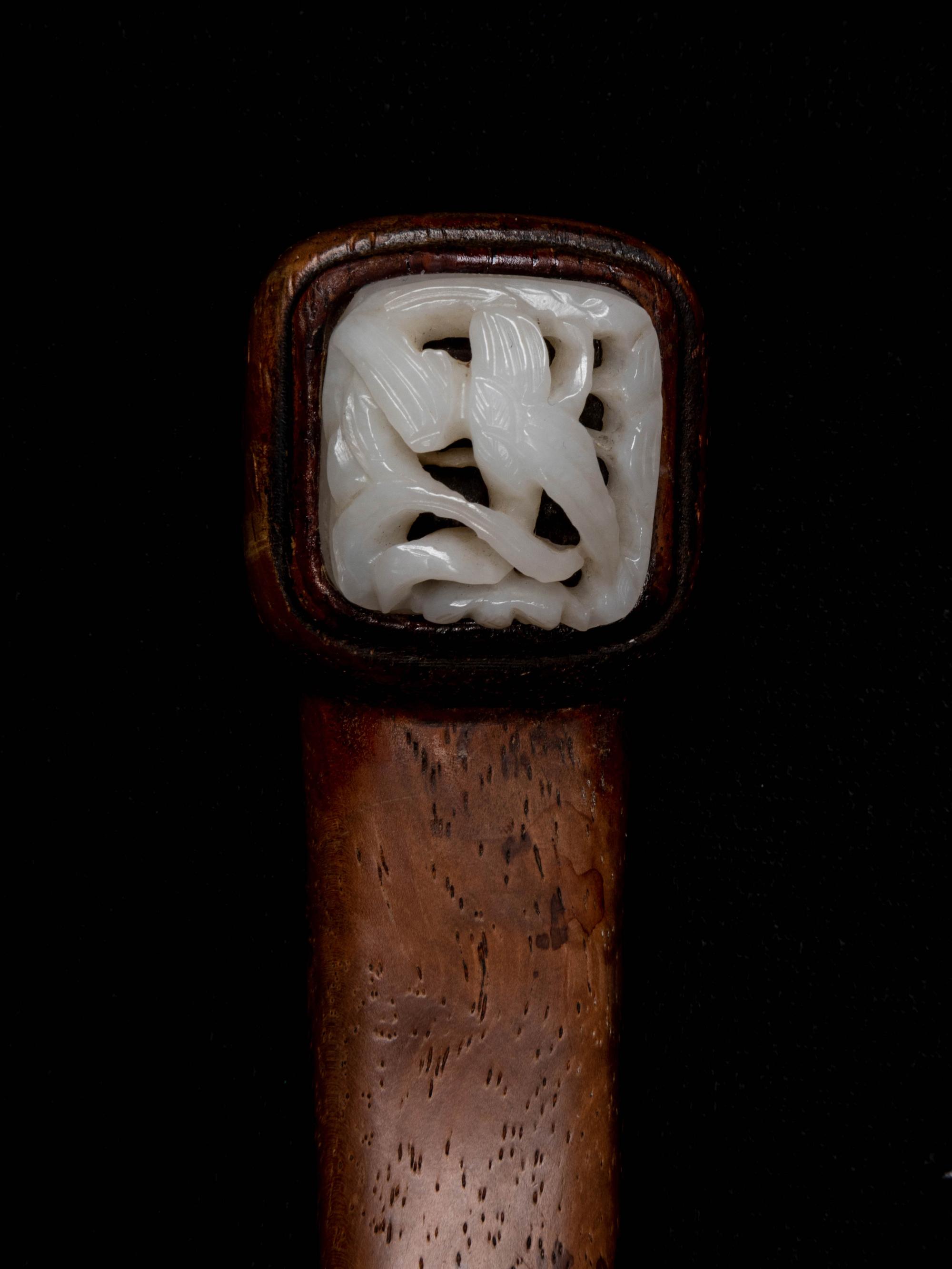 A Chinese White Jade Inset Hardwood Ruyi Scepter