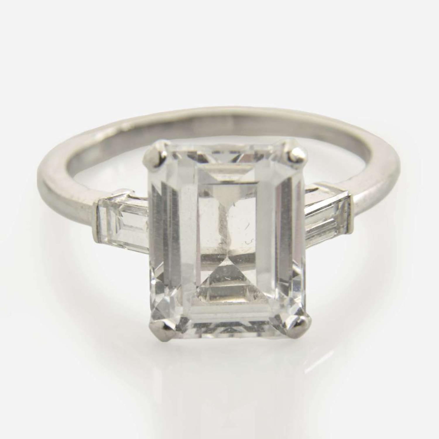 A Platinum, White Sapphire, and Diamond Ring Set