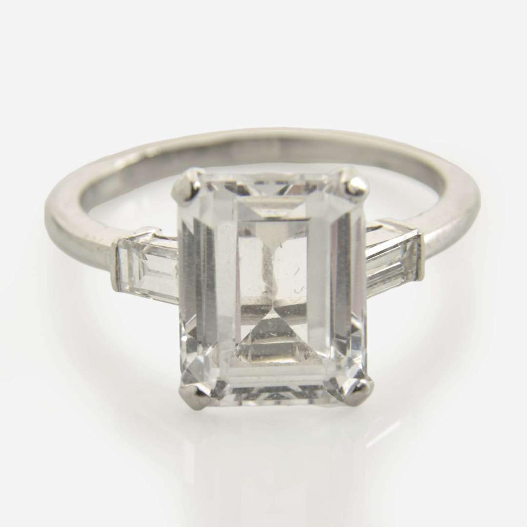 A Platinum, White Sapphire, and Diamond Ring Set