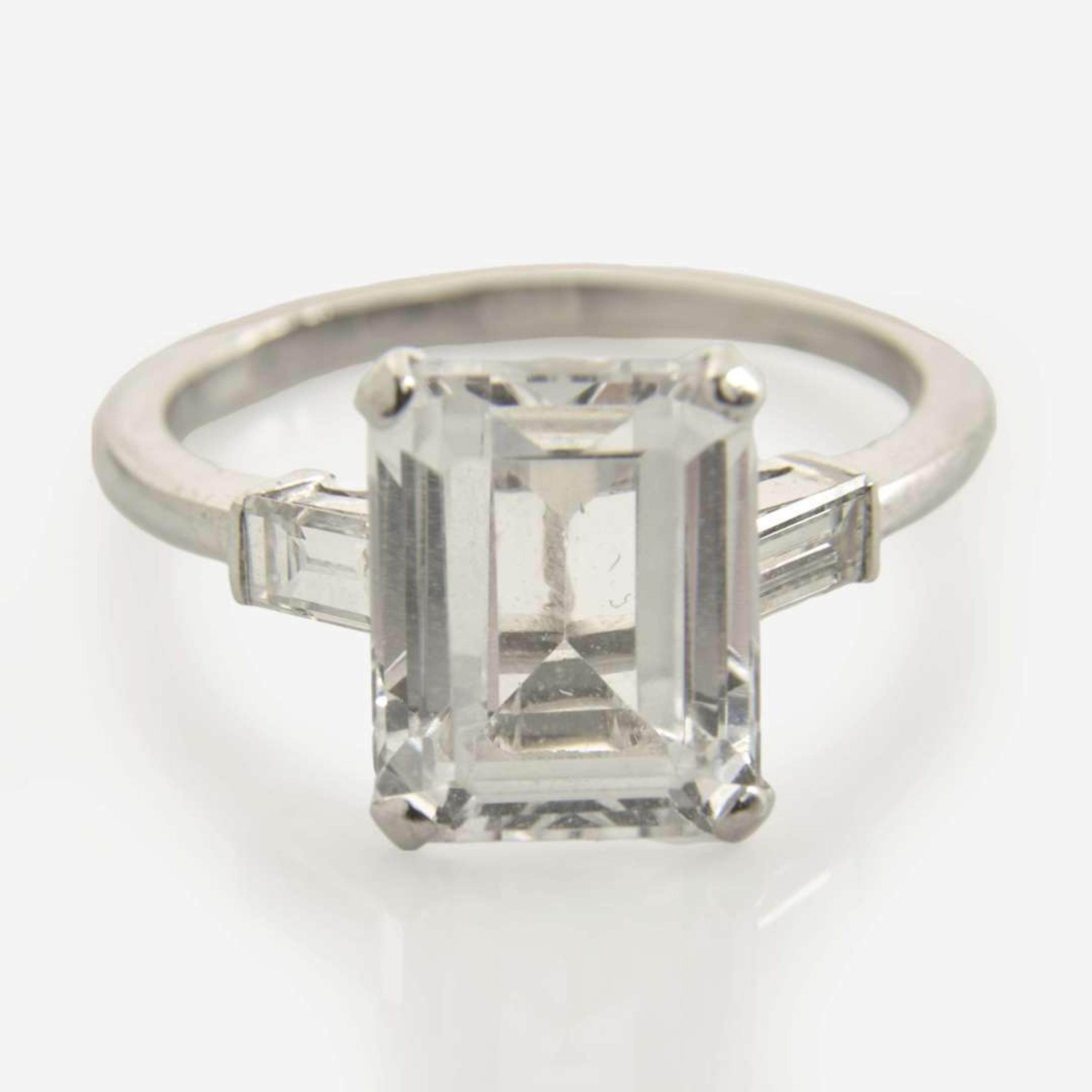A Platinum, White Sapphire, and Diamond Ring Set