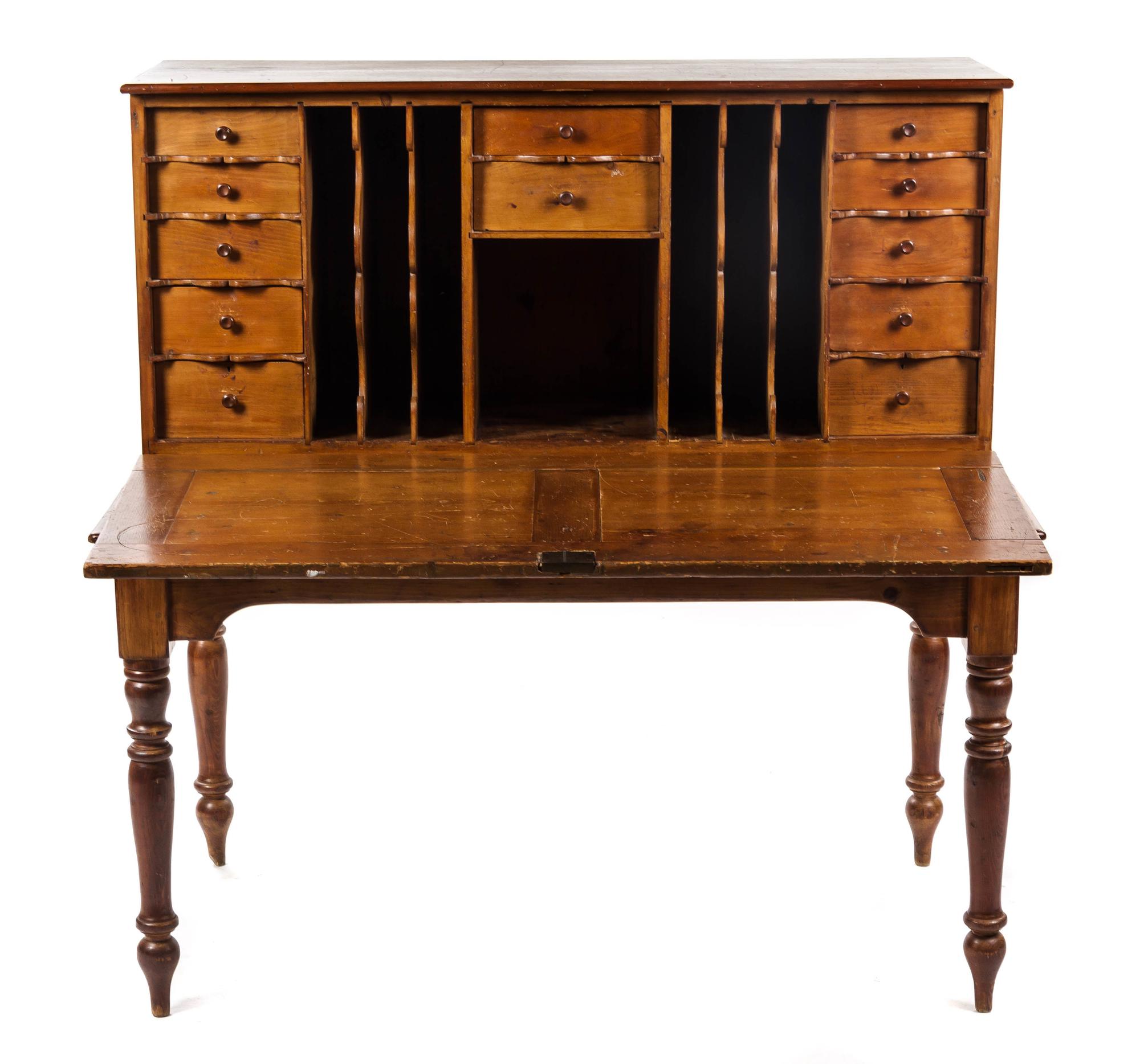 An American Pine Schoolmaster's Desk, MID-19TH CENTURY, Height 50 1/2 x width 48 3/4 x depth 29 1/4 inches. — MID-19TH CENTURY,