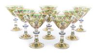 An Enameled Glass Table Service Diameter 14 inches.