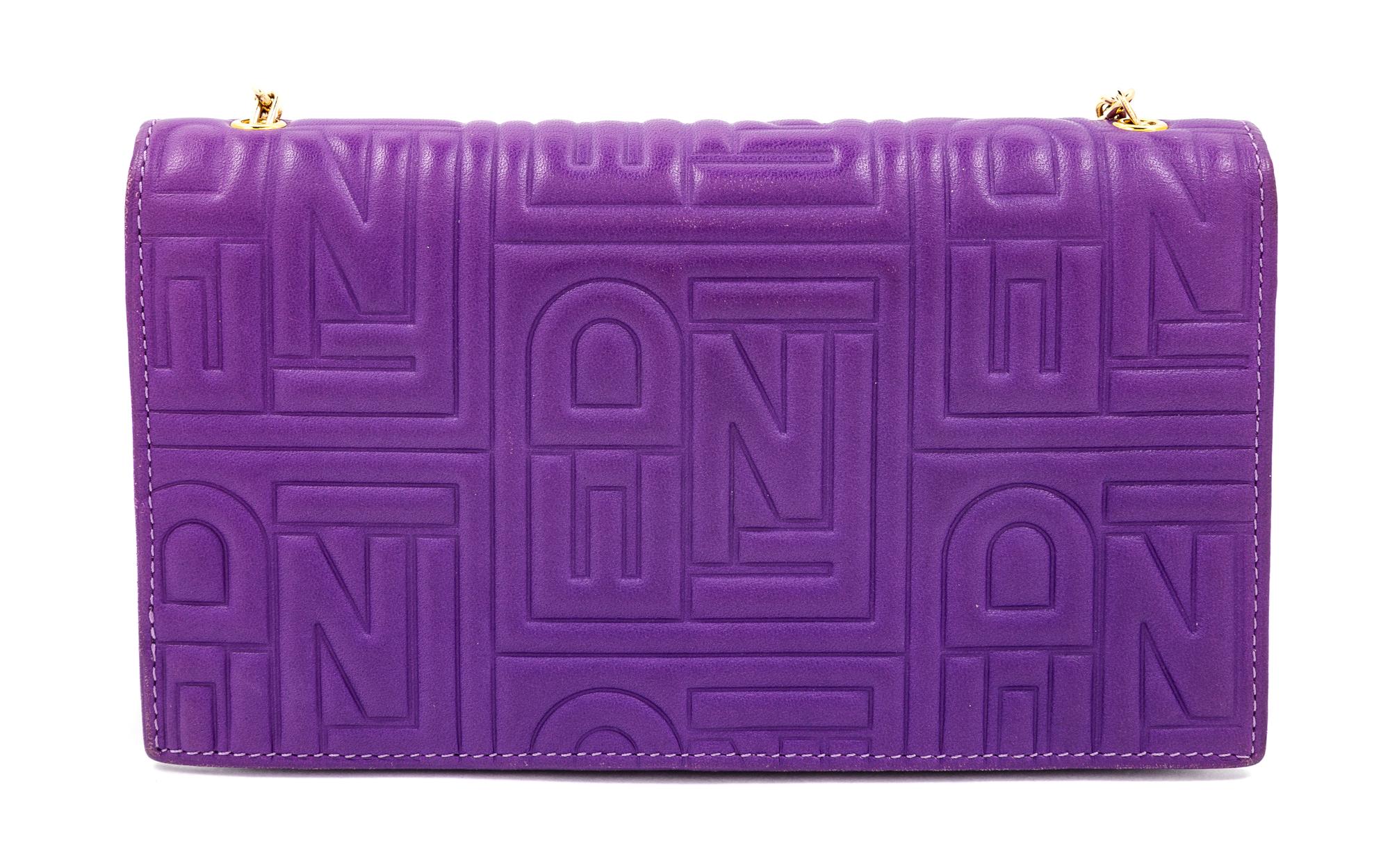 A Fendi Purple Monogram Embossed Leather Wallet/Shoulder Bag, 4" H x 7.5" W x .75" D; Strap drop: 19".