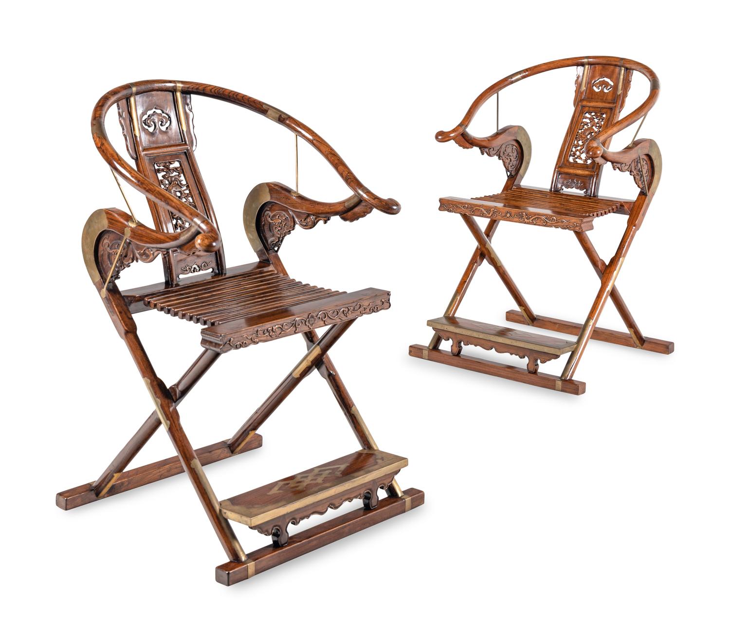 A Pair of Chinese Brass Mounted Hardwood Horseshoe-Back Campaign Chairs