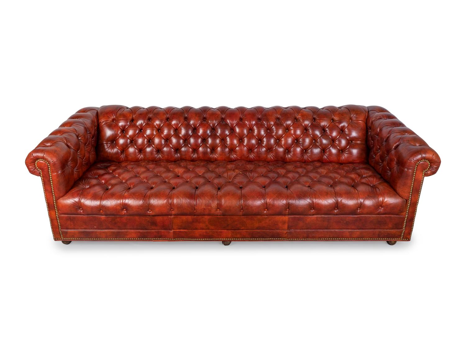 A Chesterfield Style Faux Leather and Brass Studded Sofa and Settee — 20TH CENTURY