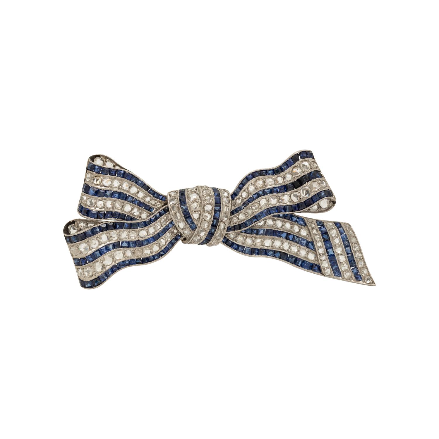 CARTIER, SAPPHIRE AND DIAMOND BOW BROOCH