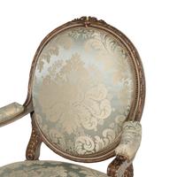 A Set Three of Louis XVI Style Grey-Painted and Parcel Gilt Fauteuils