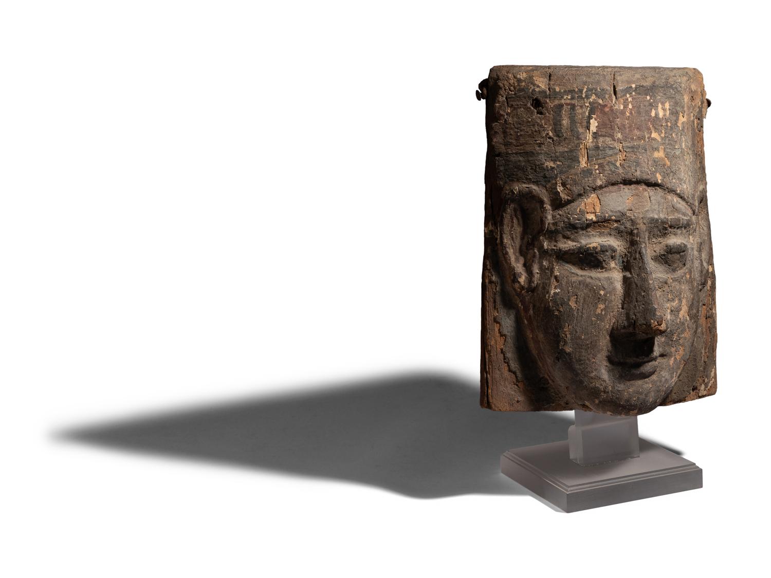 An Egyptian Painted Wood Mummy Mask