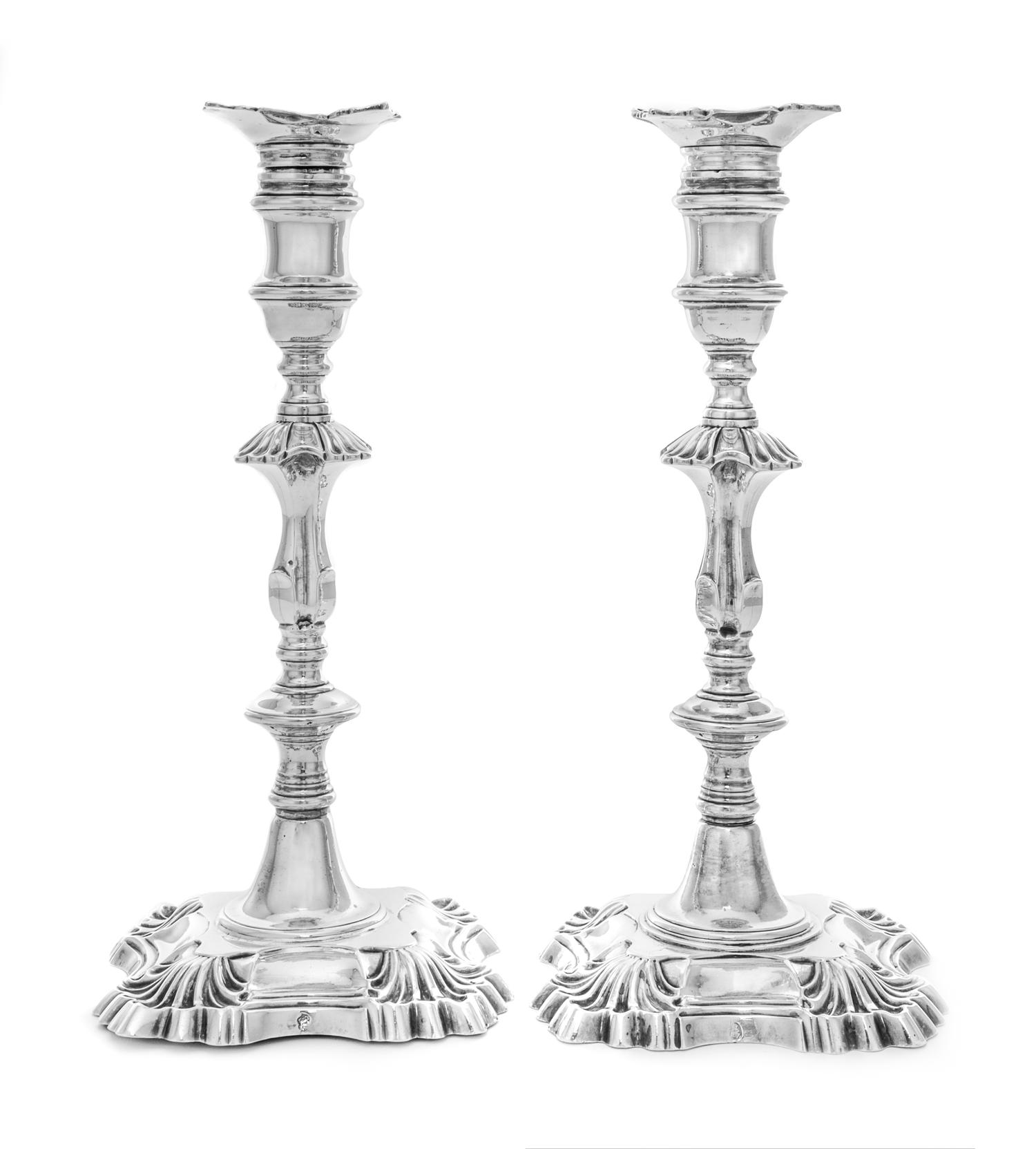 A Pair of Irish Georgian Silver Candlesticks, Possibly George Hill, Dublin, Mid-18th Century, each having a baluster form cup surmounti