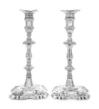 A Pair of Irish Georgian Silver Candlesticks, Possibly George Hill, Dublin, Mid-18th Century, each having a baluster form cup surmounti