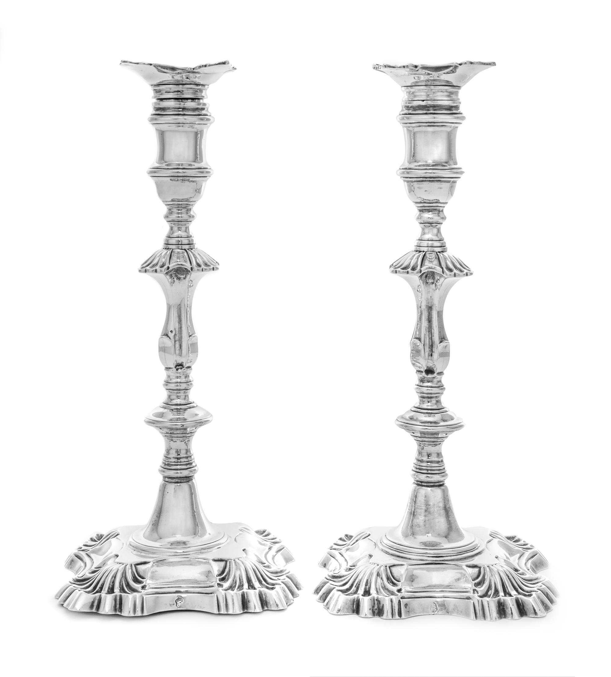 A Pair of Irish Georgian Silver Candlesticks, Possibly George Hill, Dublin, Mid-18th Century, each having a baluster form cup surmounti