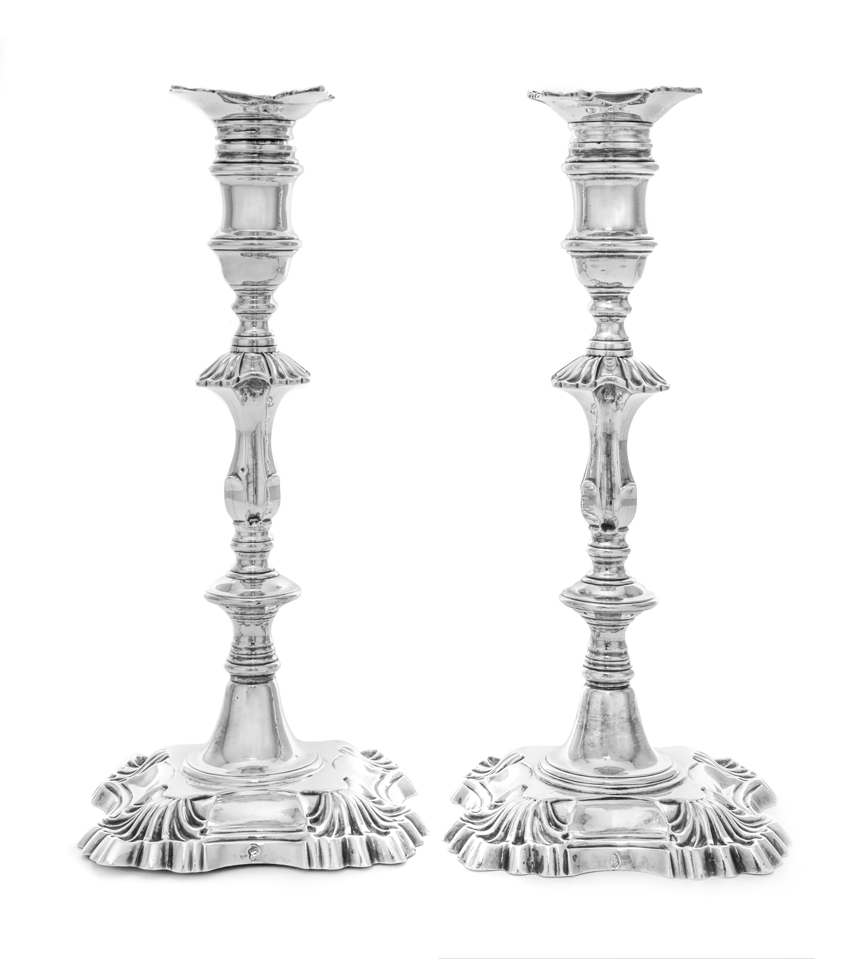 A Pair of Irish Georgian Silver Candlesticks, Possibly George Hill, Dublin, Mid-18th Century, each having a baluster form cup surmounti