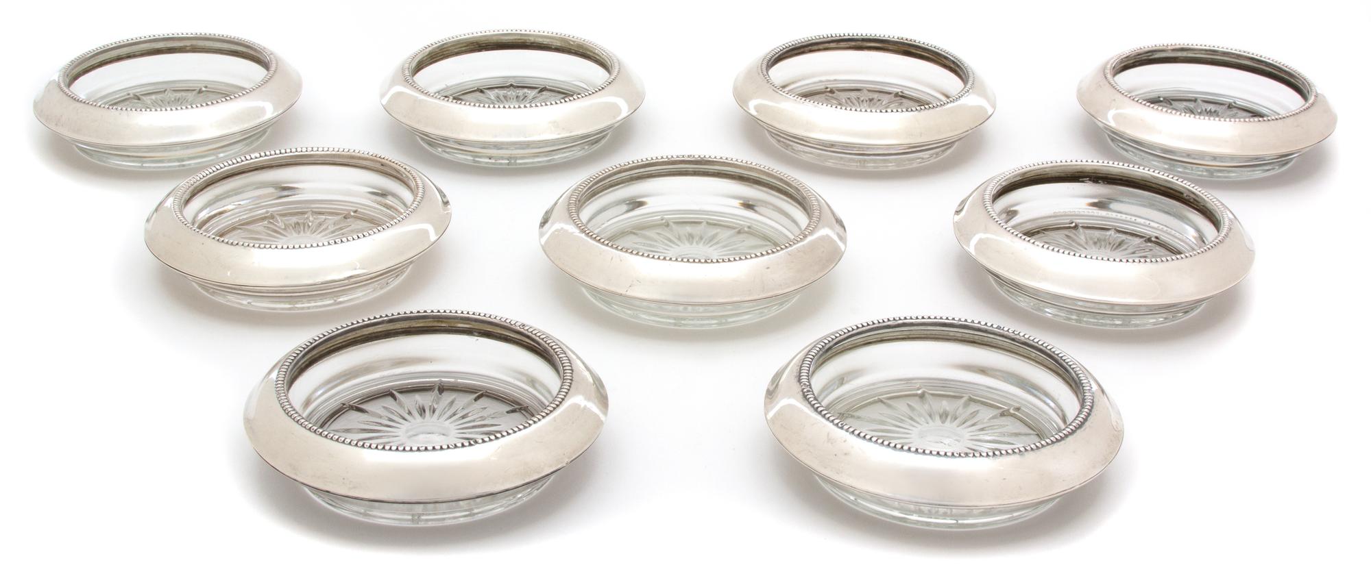 A Set of Nine American Silver Collared Glass Coasters, Frank M. Whiting & Co., North Attleboro, MA, 20th Century, with glass inserts