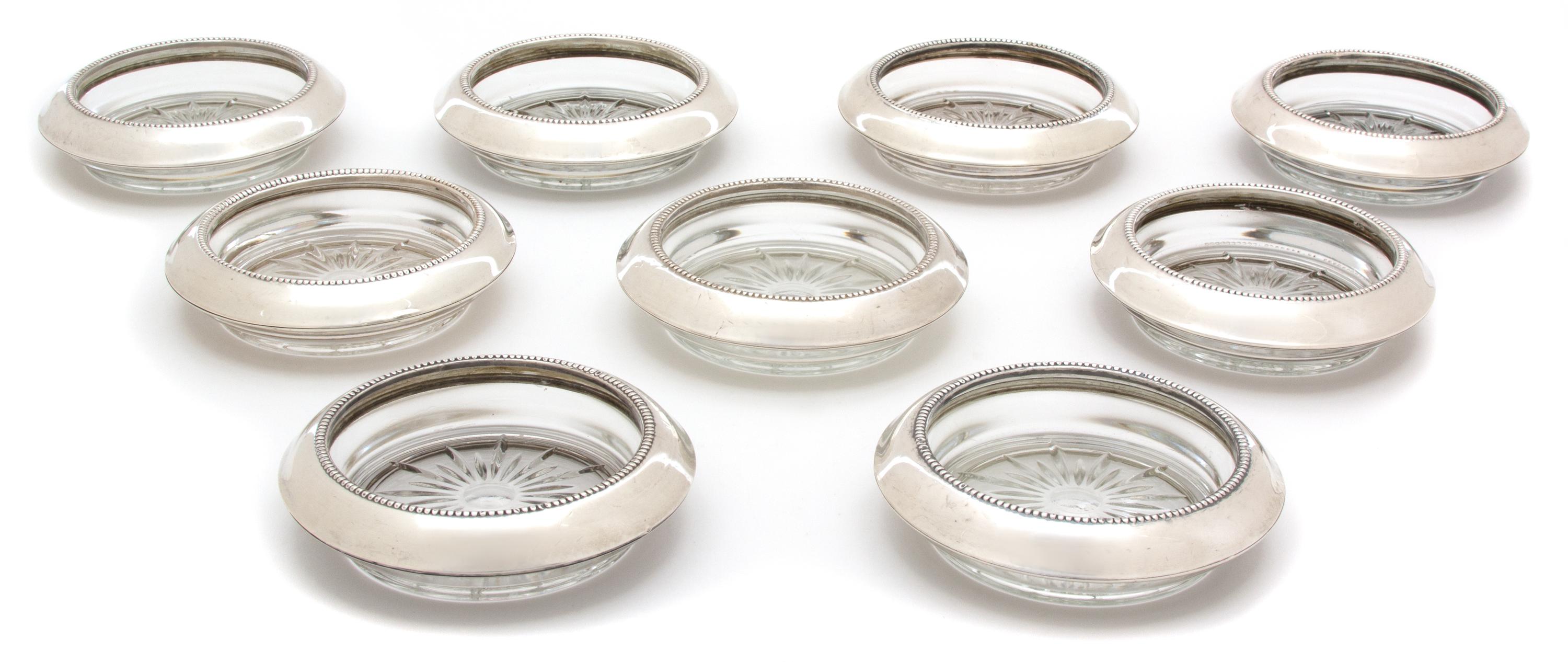 A Set of Nine American Silver Collared Glass Coasters, Frank M. Whiting & Co., North Attleboro, MA, 20th Century, with glass inserts
