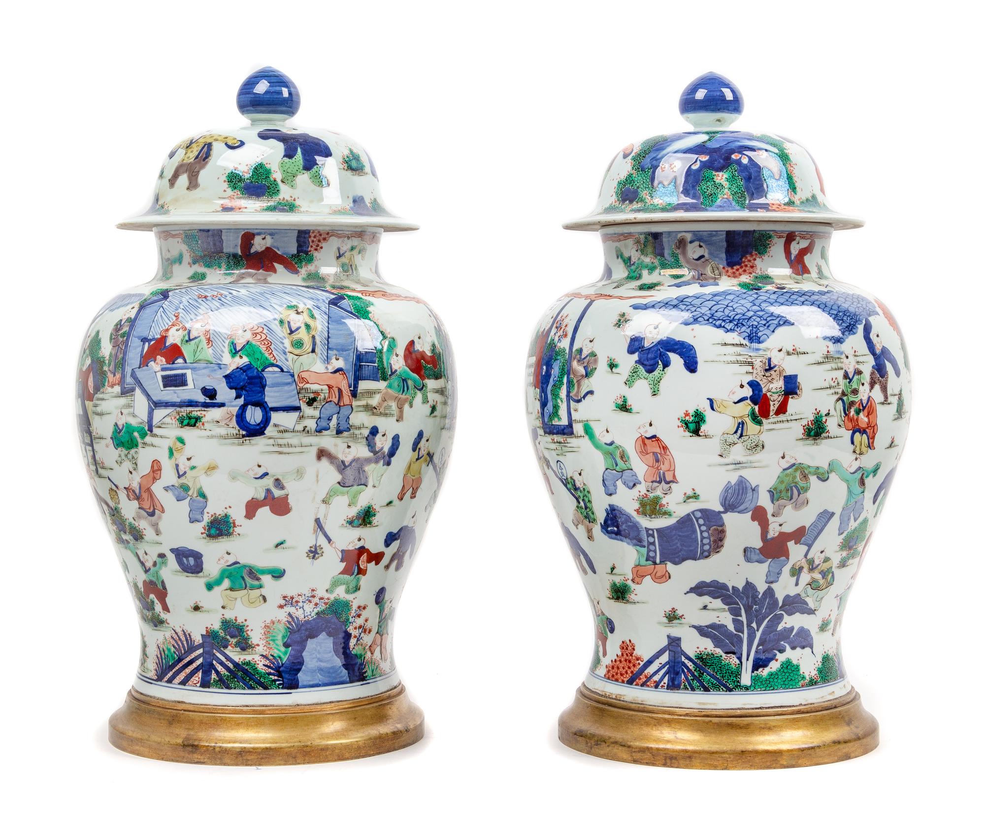 A Large Pair of Chinese Wucai Porcelain Covered Jars Height 27 inches. — 20TH CENTURY