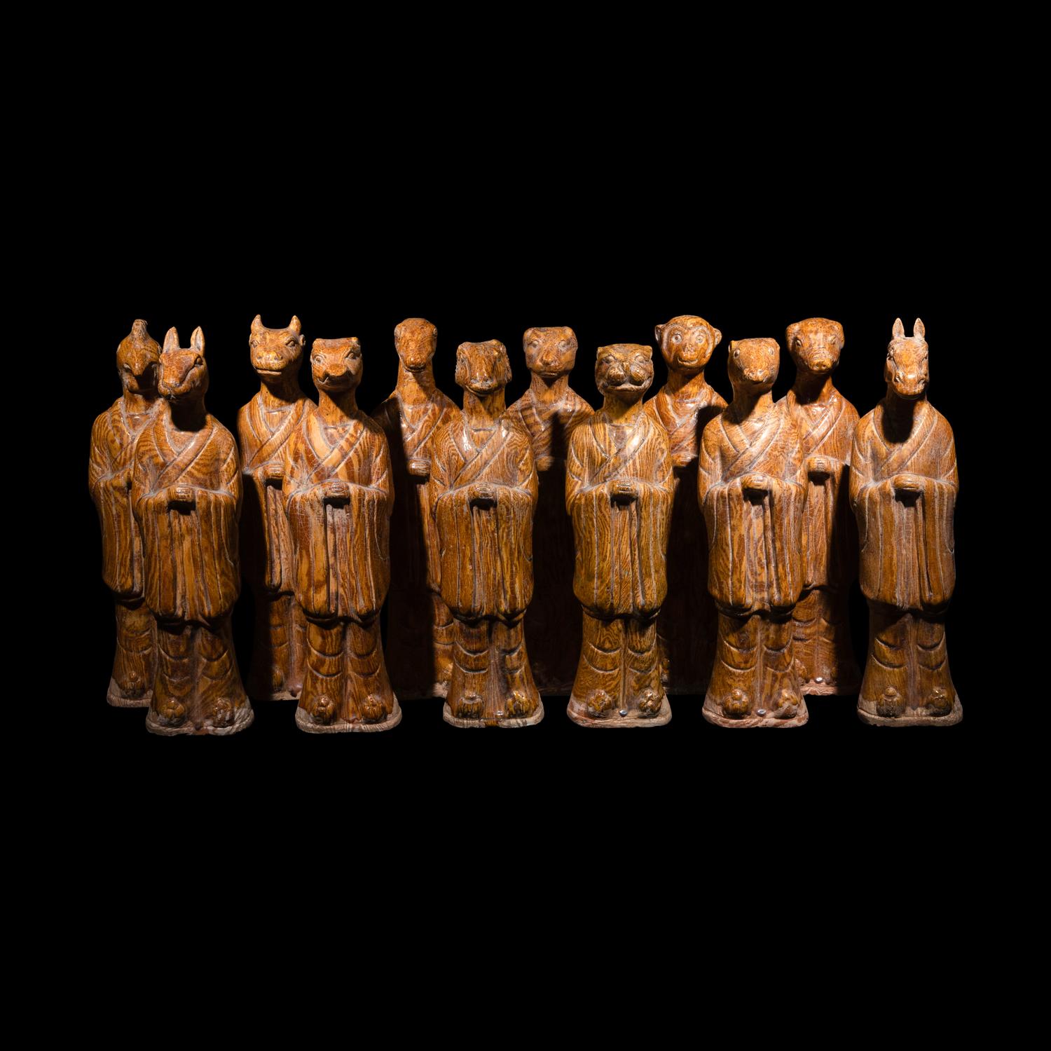 A Set of Twelve Chinese Marbleized Pottery Zodiac Figures, 18th Century or Earlier 清或更早 絞胎釉十二生肖像一組