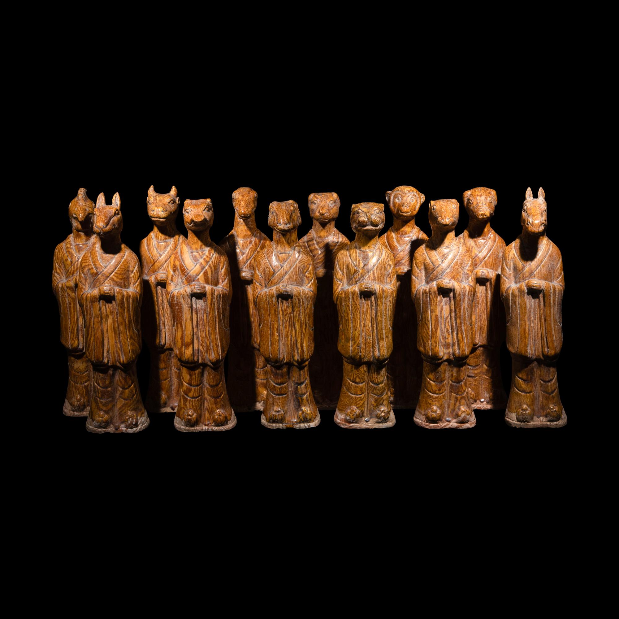A Set of Twelve Chinese Marbleized Pottery Zodiac Figures, 18th Century or Earlier 清或更早 絞胎釉十二生肖像一組