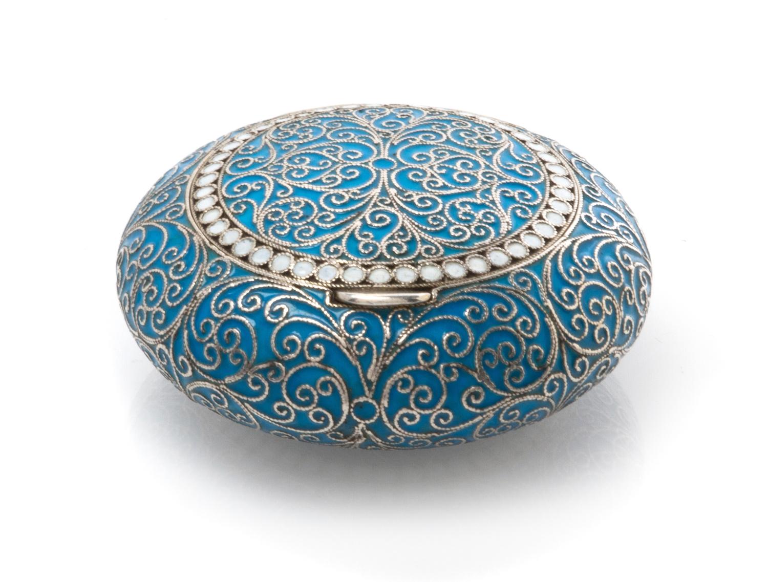 A Russian Enameled Silver Snuff Box, Maker's mark GK, Moscow, late 19th/early 20th century, of circular form, having a light blue ename