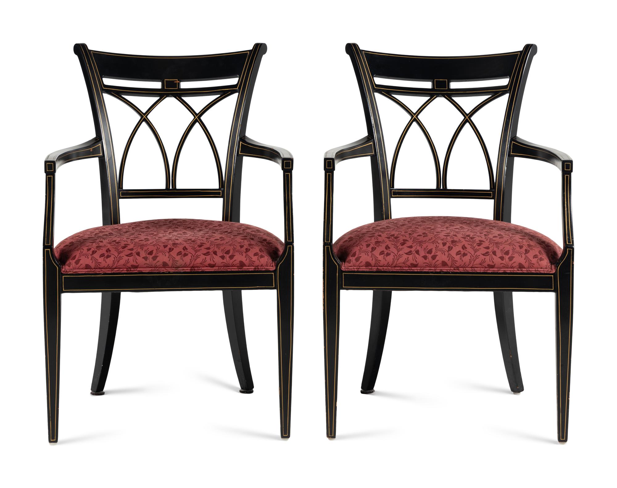 A Pair of Regency Style Ebonized and Parcel-Gilt Armchairs