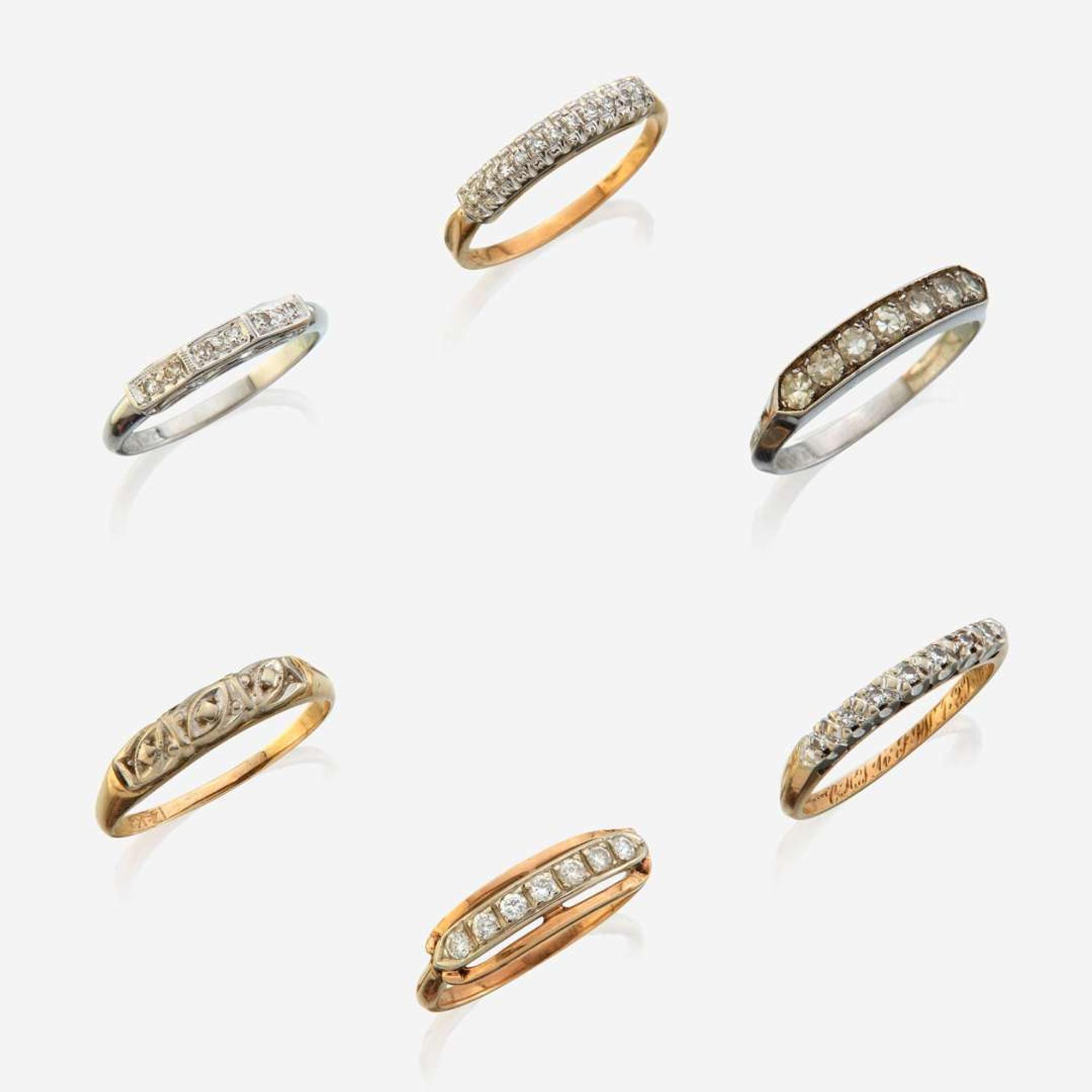A collection of six gem-set rings