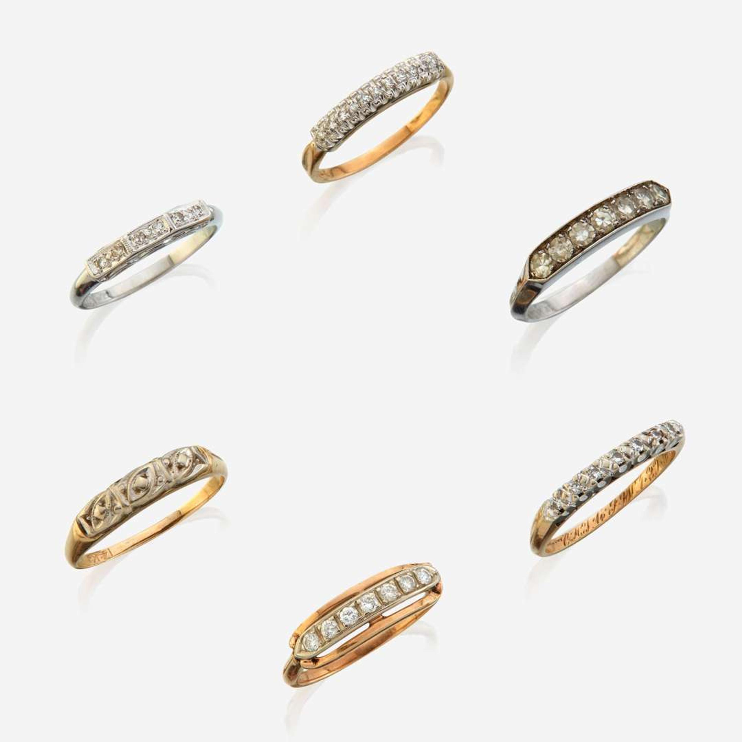 A collection of six gem-set rings