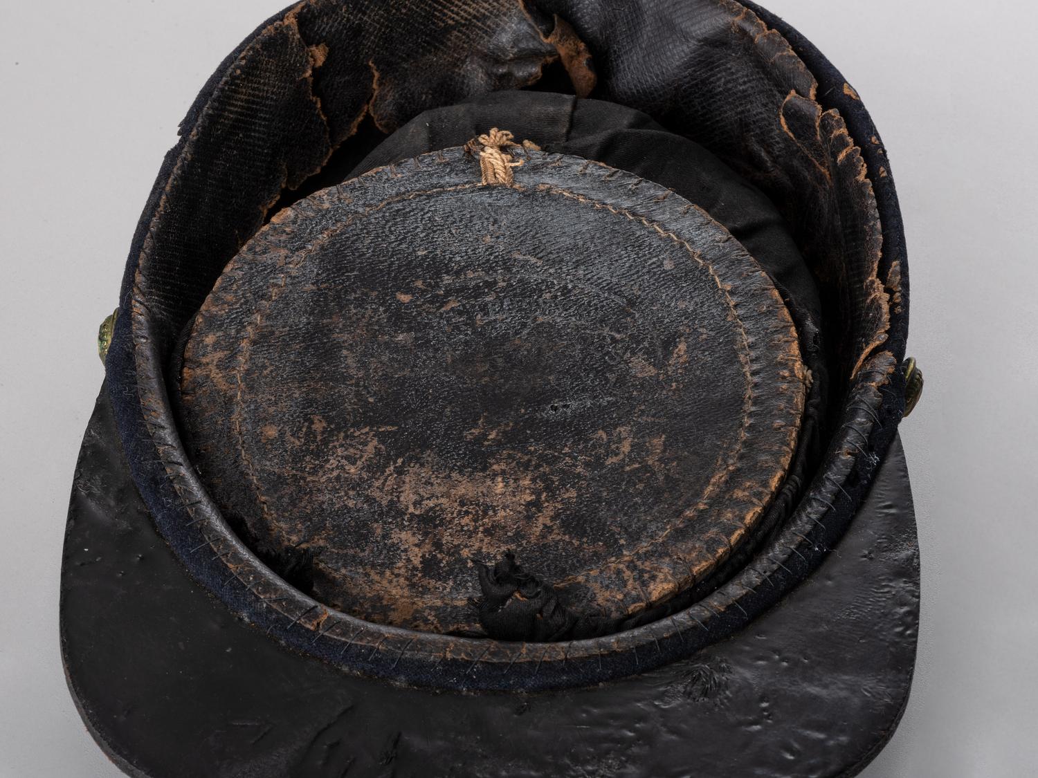 [CIVIL WAR]. Late-war 12th New York Militia kepi, manufactured by J.H. McKenney & Co., New York.