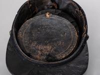 [CIVIL WAR]. Late-war 12th New York Militia kepi, manufactured by J.H. McKenney & Co., New York.