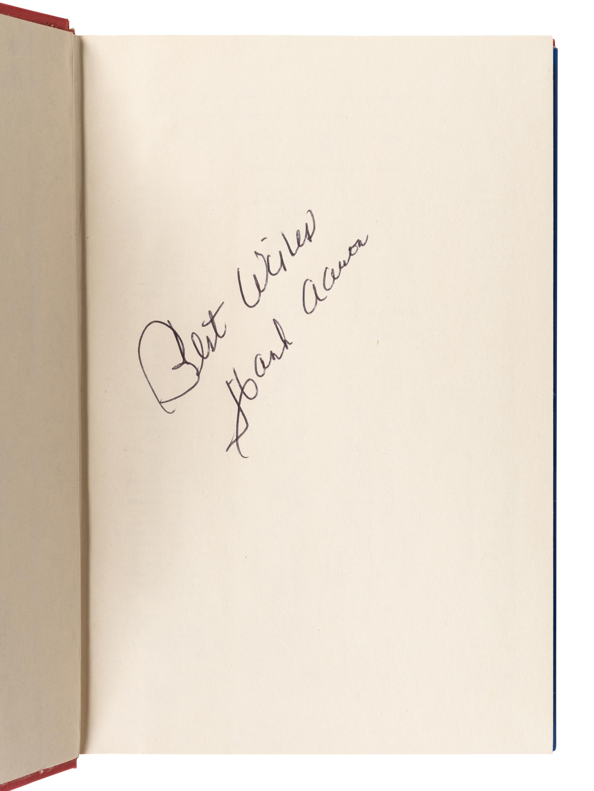 A Group of Two Hank Aaron Signed Autograph Books,