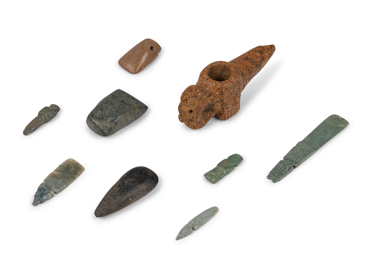 Eight Costa Rican Jade Celts and Pendants and a Costa Rican Stone Zoomorphic Mace Head