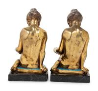 A Pair of Gilt Metal Figures of Seated Maidens