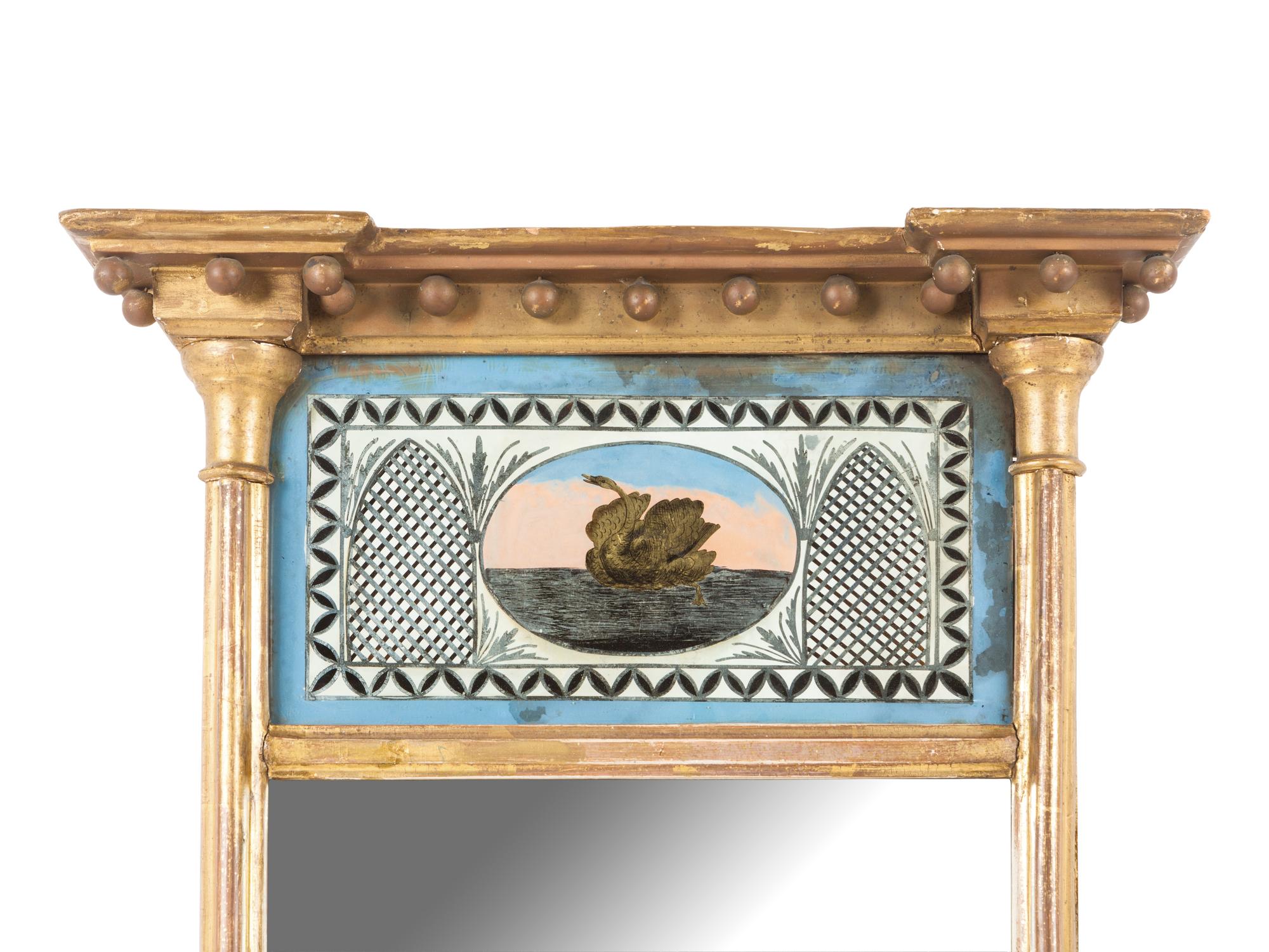 A Classical Giltwood and Eglomise Mirror