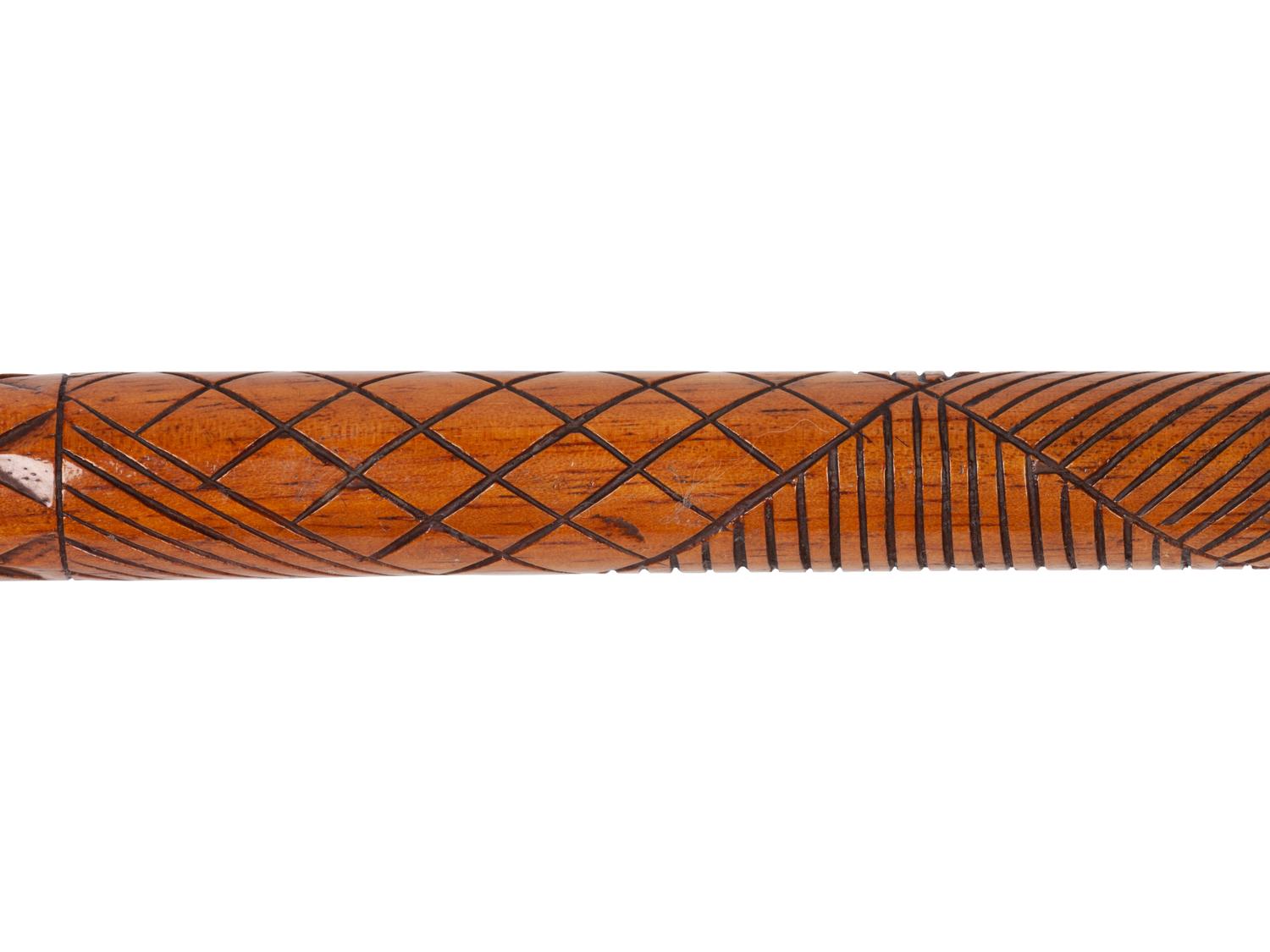 A Group of Folk Art Carved Shoe-Form Canes