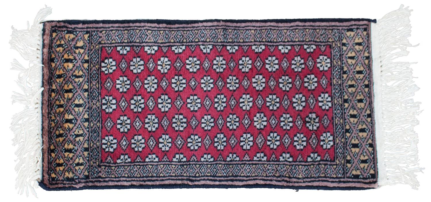 Two Senneh Wool Mats Each 2 feet x 1 foot.