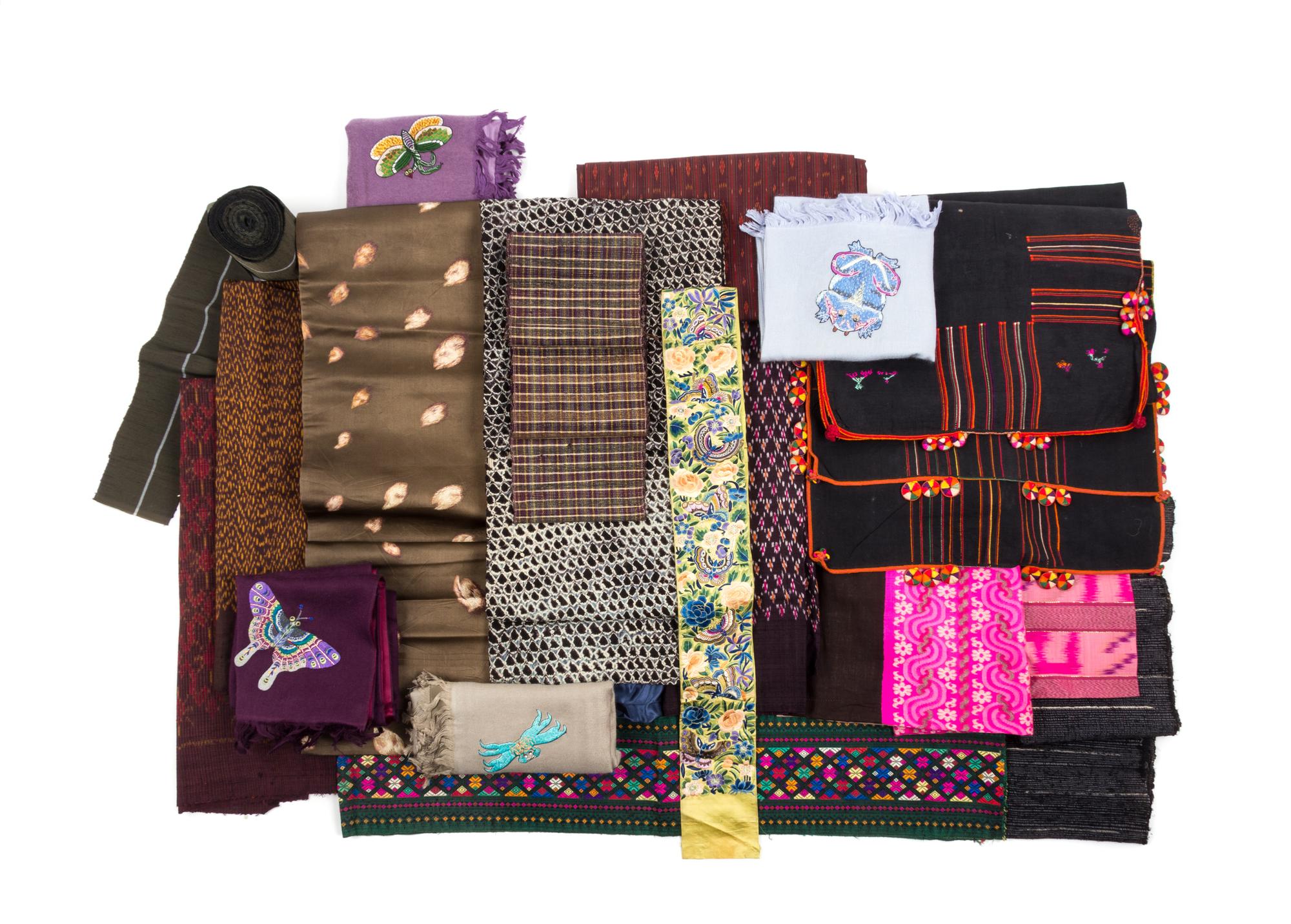 Twenty Asian Textiles Approximate length of largest 151 inches.