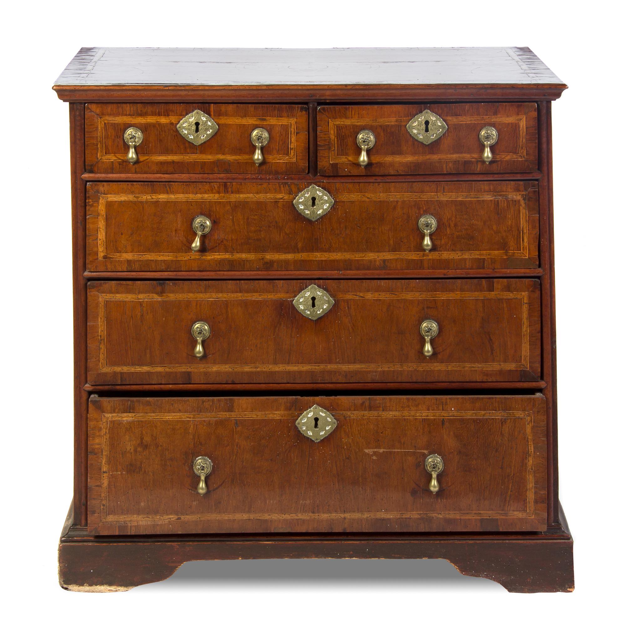 A Charles II Walnut Chest of Drawers, Height 34 x width 35 x depth 21 inches.