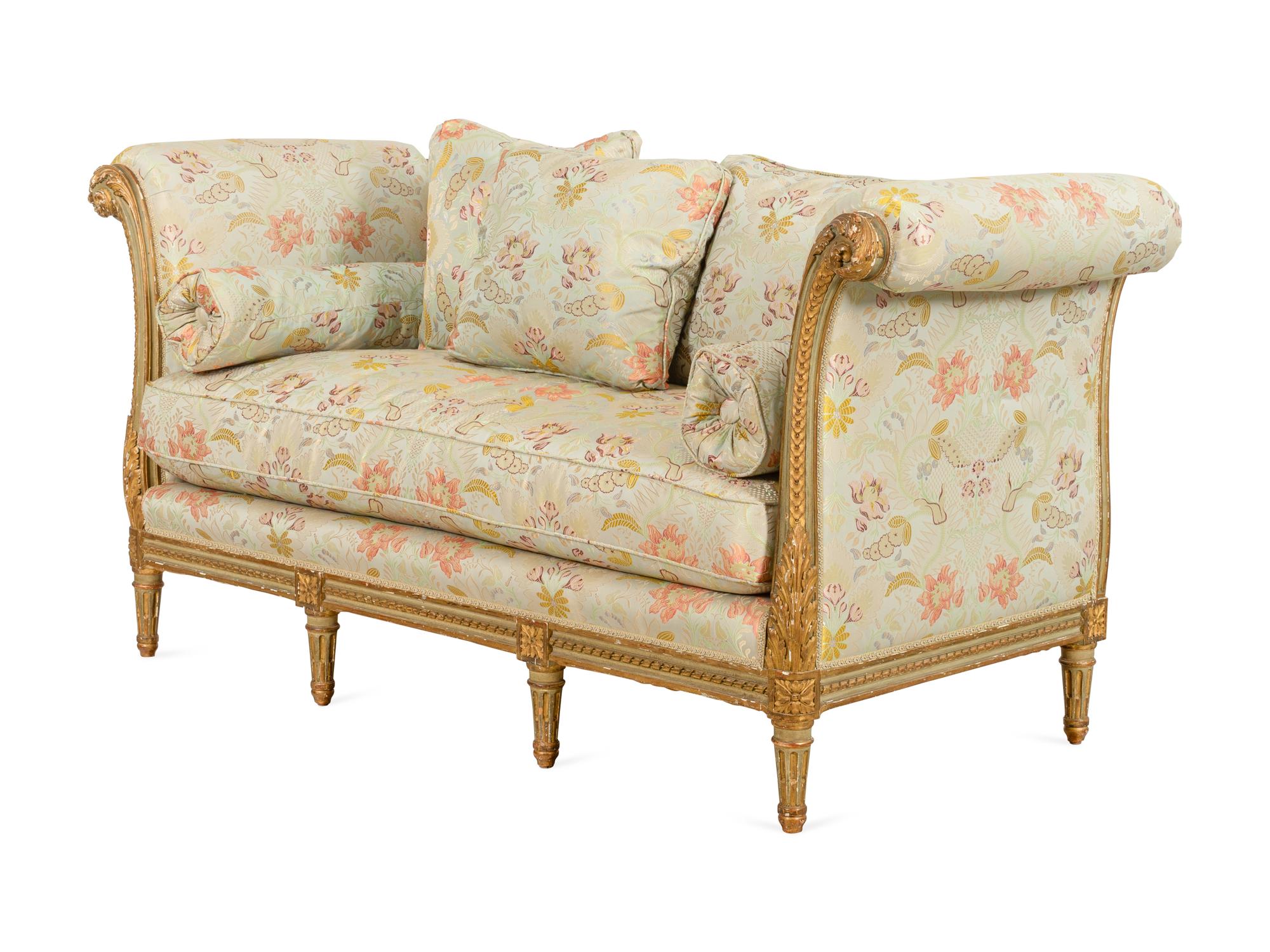 A Louis XVI Style Painted and Parcel Gilt Settee