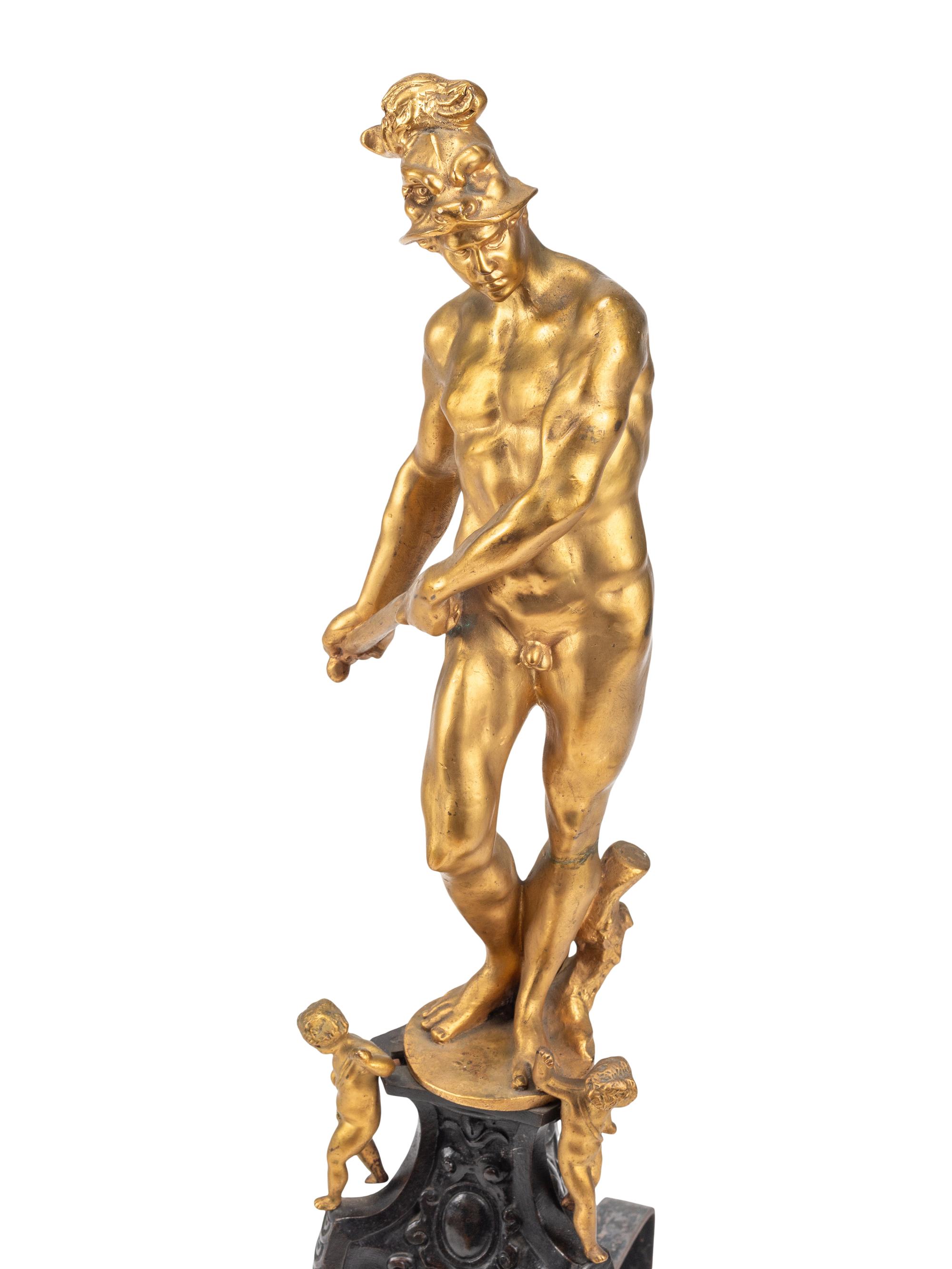 A Pair of Large Baroque Style Gilt and Patinated Bronze Figural Chenets