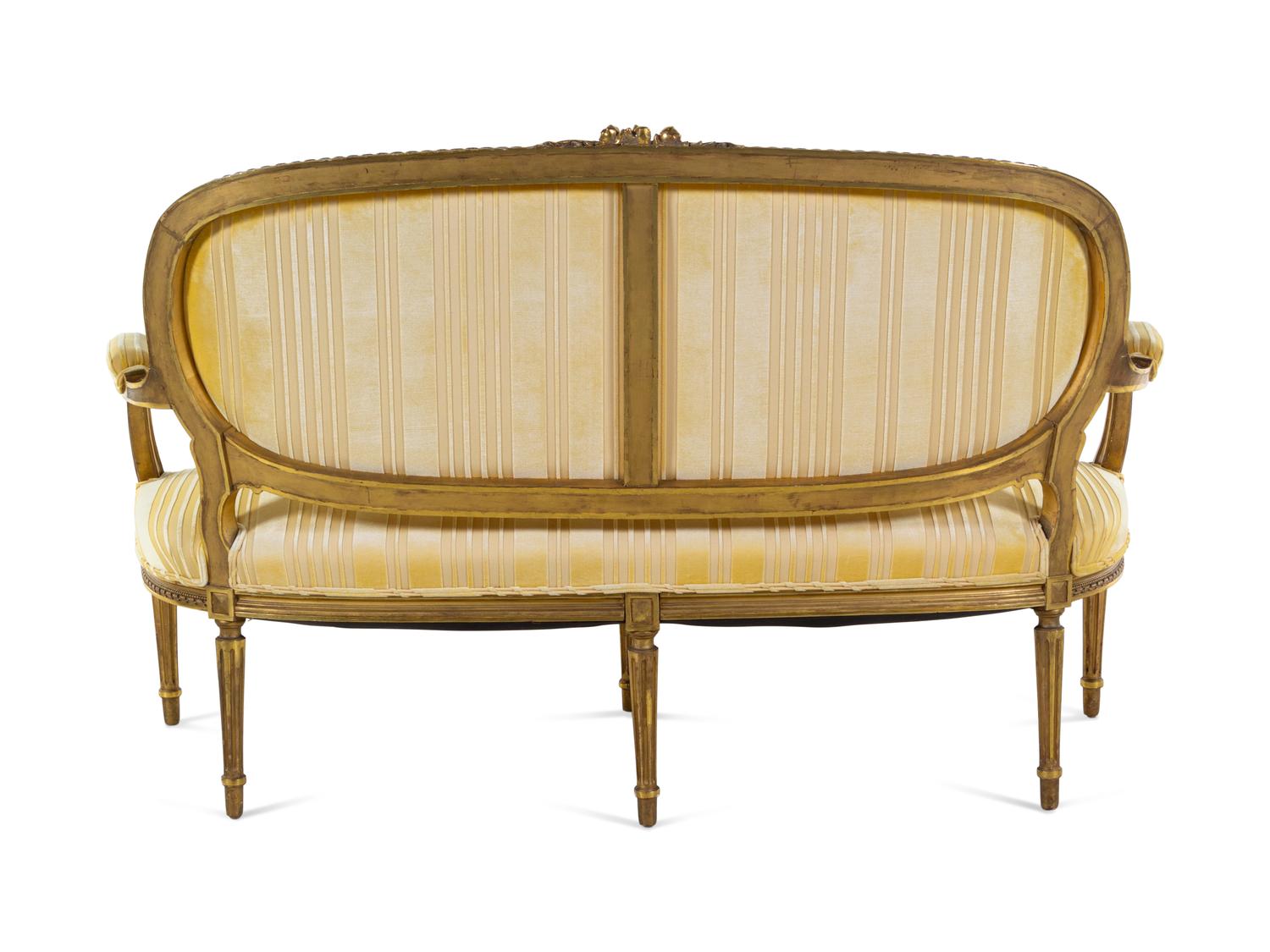 A Louis XVI Style Carved Giltwood Sofa