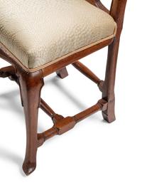 A Set of Eight Dutch Rococo Walnut Dining Chairs