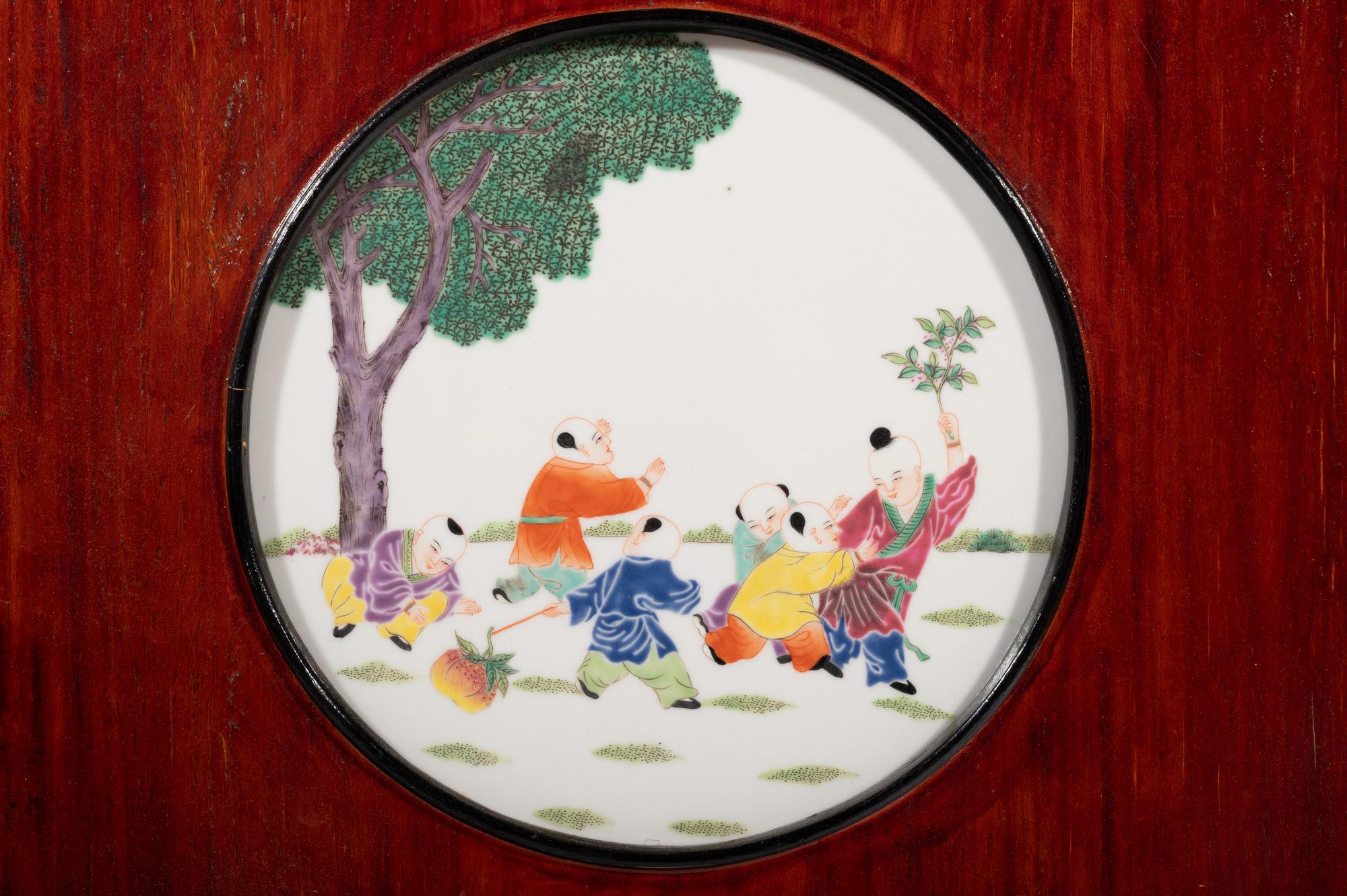 A Set of Four Chinese Famille Rose Porcelain Inset Hardwood Hanging Screens