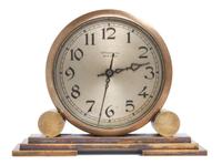An Art Deco Brass Desk Clock Height 4 7/8 x width 6 3/8 x depth 2 1/4 inches. — TIFFANY & CO., NEW YORK