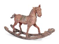 An Indian Polychromed and Carved Wood Rocking Horse — LATE 19TH/EARLY 20TH CENTURY