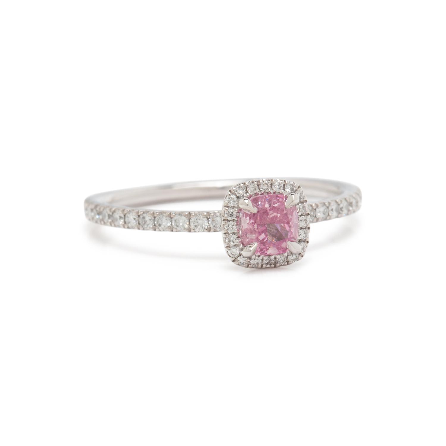 FANCY VIVID PURPLE-PINK DIAMOND AND DIAMOND RING