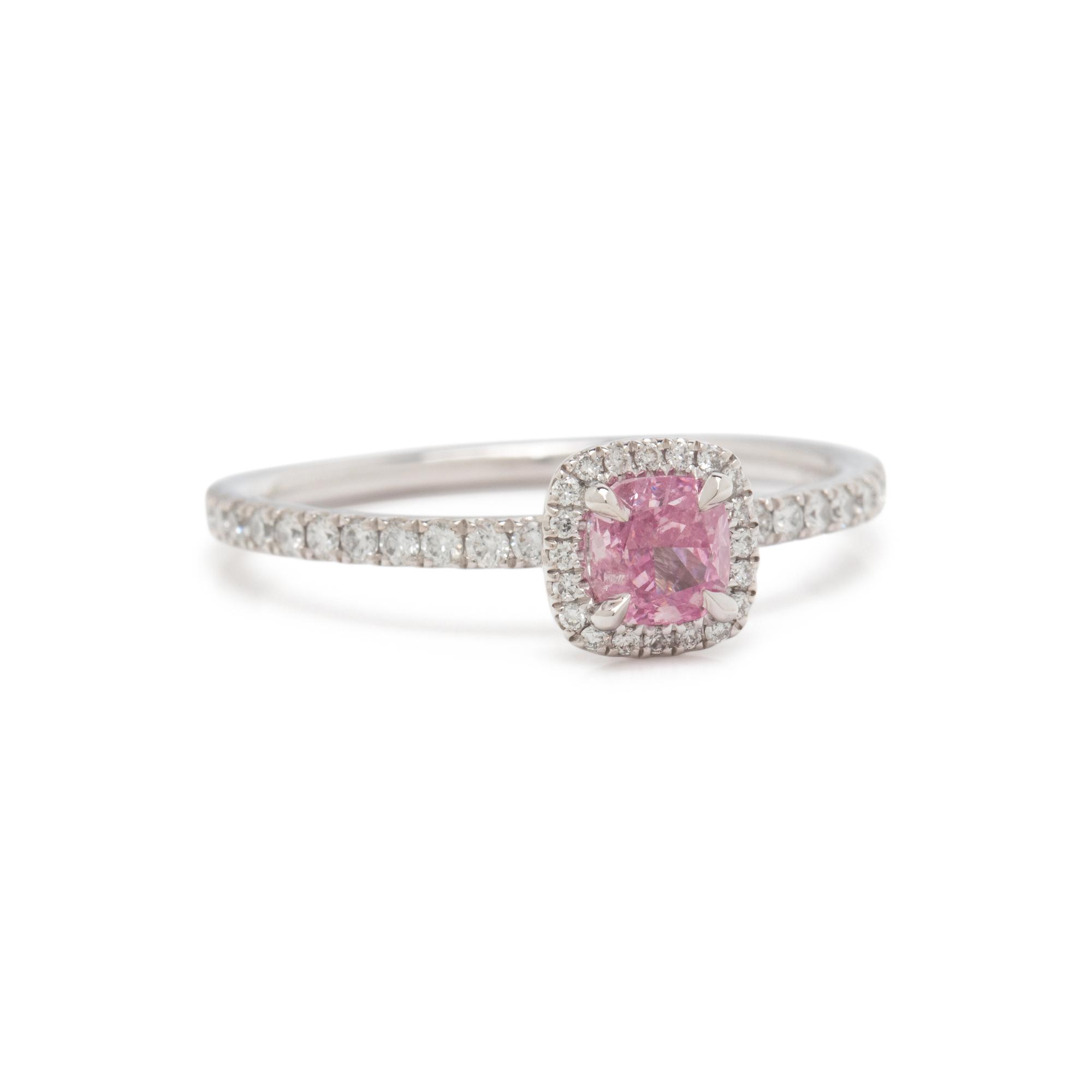 FANCY VIVID PURPLE-PINK DIAMOND AND DIAMOND RING