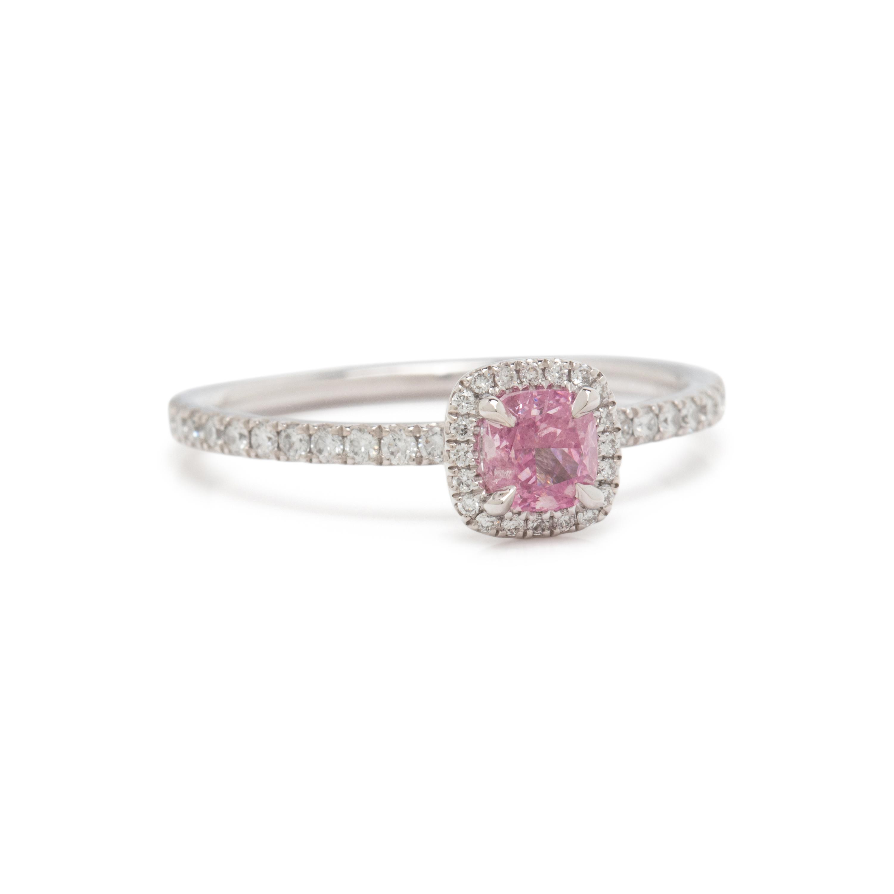FANCY VIVID PURPLE-PINK DIAMOND AND DIAMOND RING