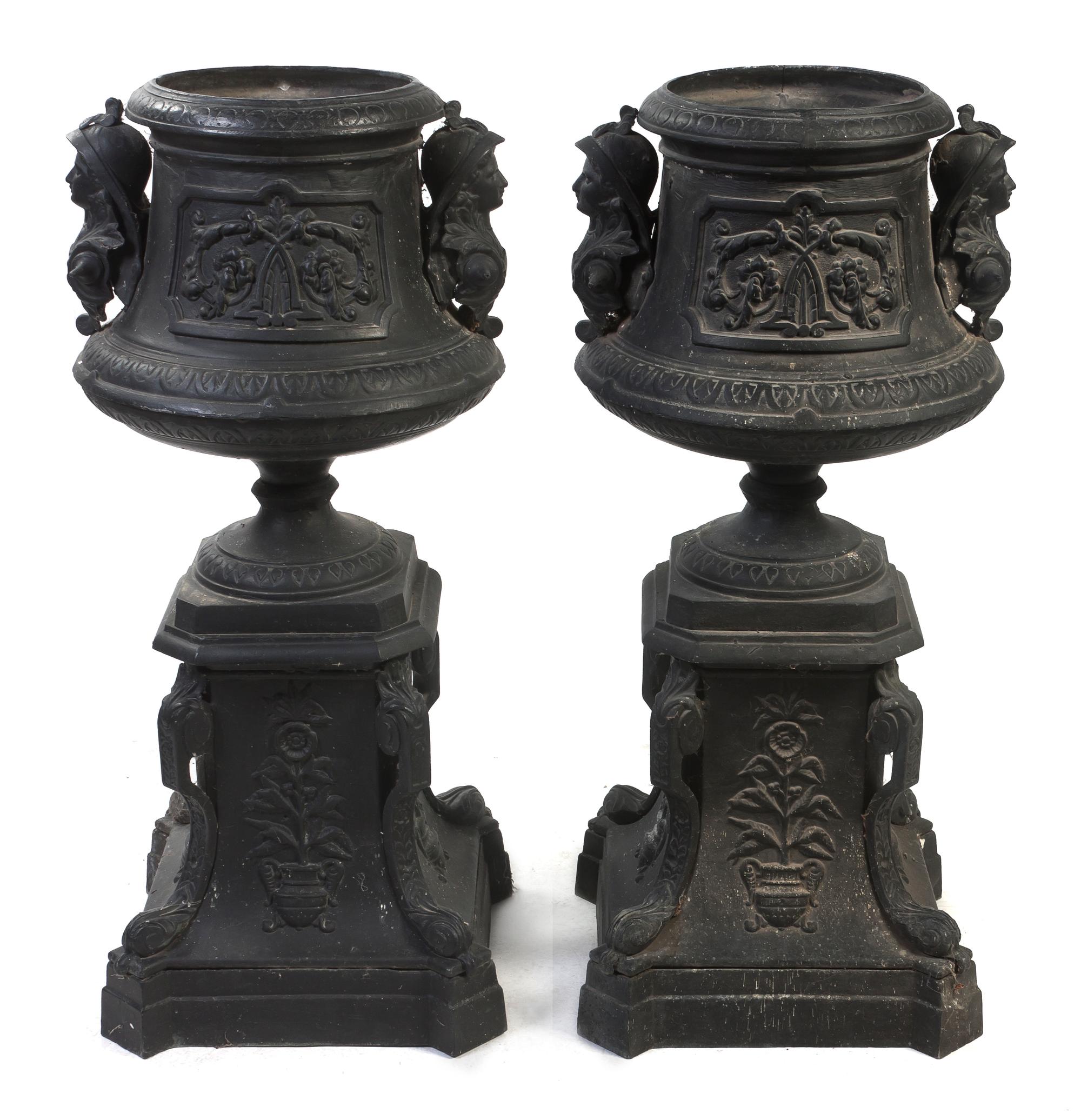 A Pair of Victorian Style Cast Aluminum Urns on Stands, Height 44 inches.