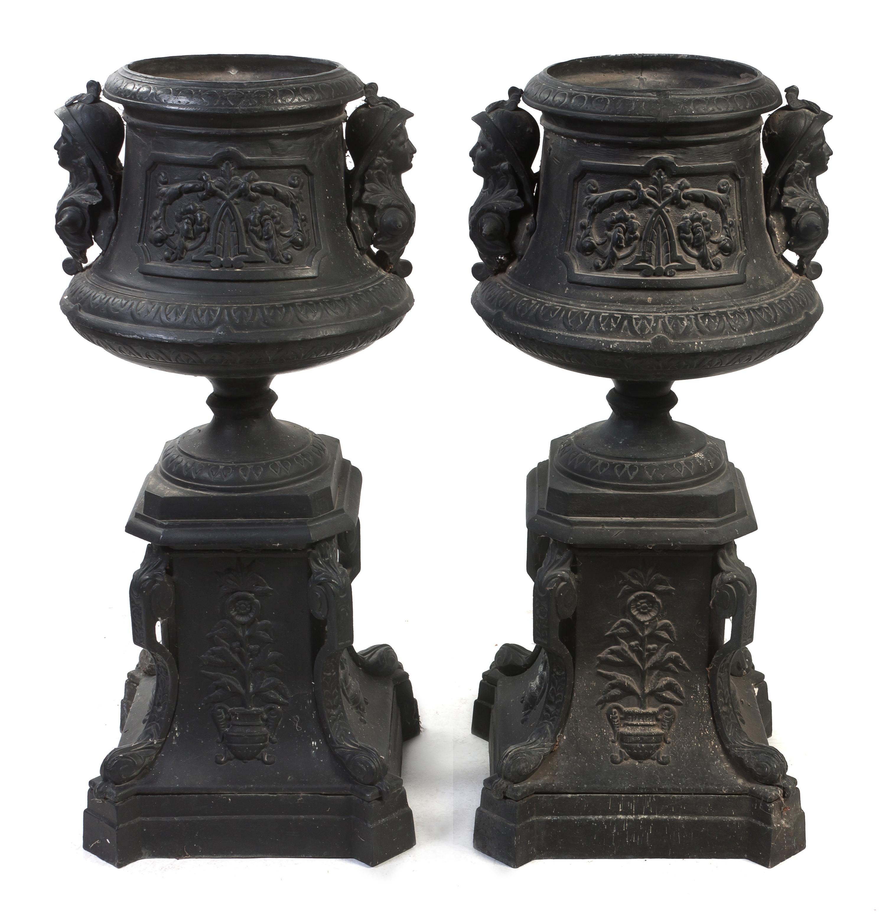 A Pair of Victorian Style Cast Aluminum Urns on Stands, Height 44 inches.