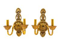 A Set of Six Neoclassical Brass Two-Light Sconces