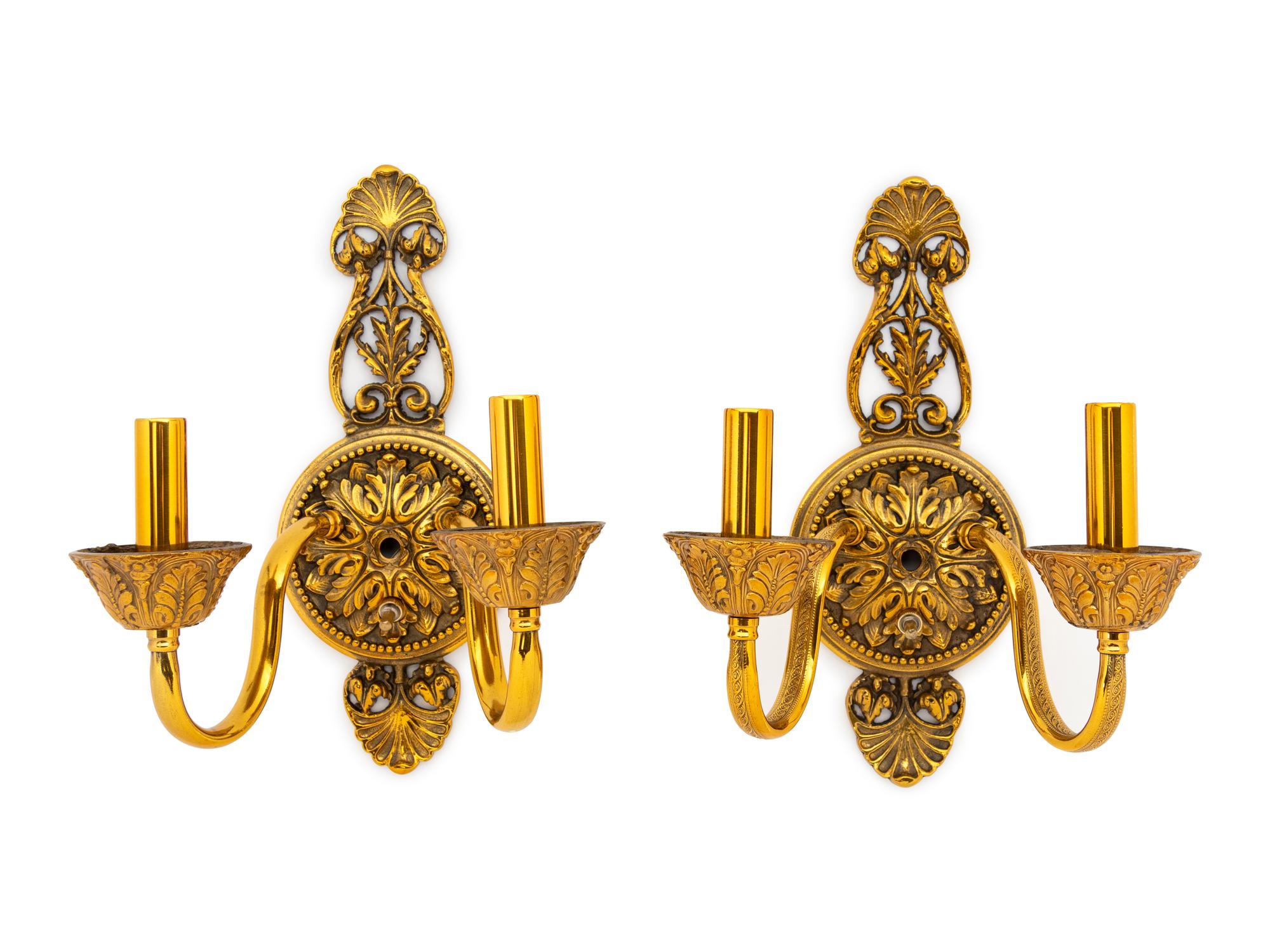 A Set of Six Neoclassical Brass Two-Light Sconces