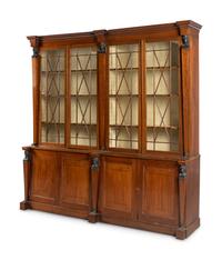 A Regency Part Ebonized Mahogany Breakfront Bookcase
